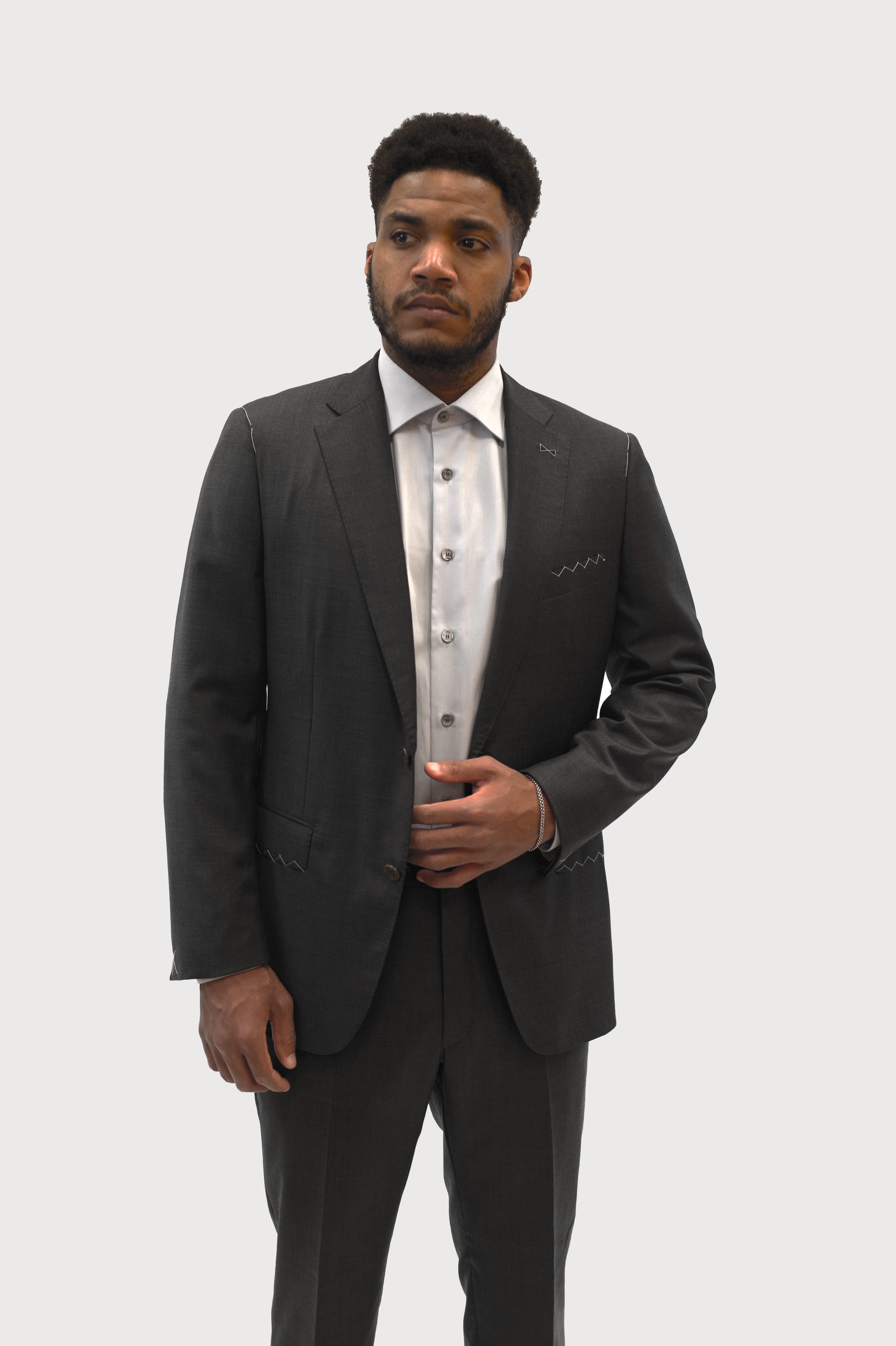 Grey pure wool suit with a pocket square and fabric by Loro Piana